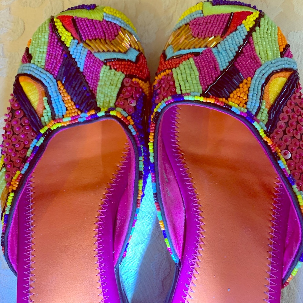 Slip on beaded Chico’s size 7.5 shoes.
